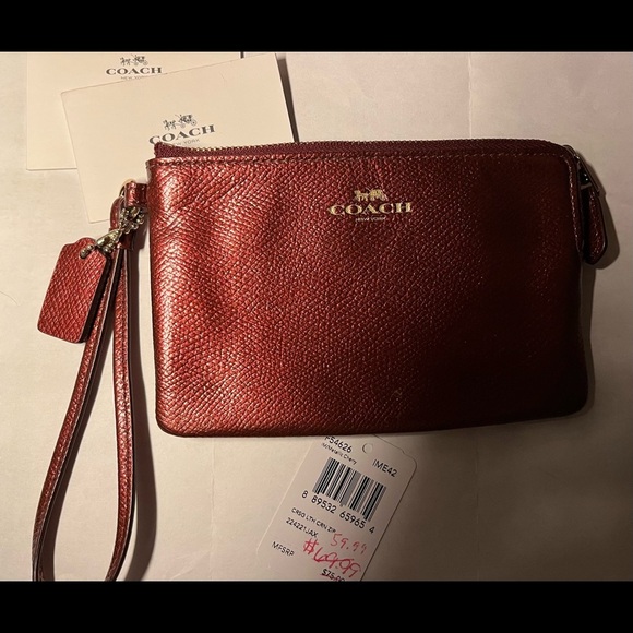 Red metallic Coach wristlet with zipper closure + bag tag attached - Picture 1 of 9